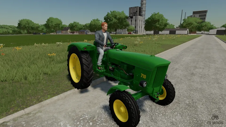 Трактор John Deere 710